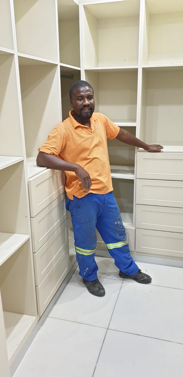 Wood Act Projects team member with fitted wardrobe